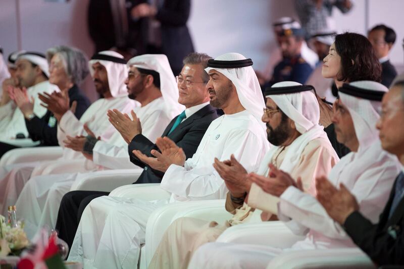 AL DHAFRA, ABU DHABI, UNITED ARAB EMIRATES - March 26, 2018: HH Lt General Sheikh Saif bin Zayed Al Nahyan, UAE Deputy Prime Minister and Minister of Interior (2nd R), HH Sheikh Tahnoon bin Mohamed Al Nahyan, Ruler's Representative in Al Ain Region (3rd R) HH Sheikh Mohamed bin Zayed Al Nahyan Crown Prince of Abu Dhabi Deputy Supreme Commander of the UAE Armed Forces (4th R), HE Moon Jea-In, President of South Korea (5th R),  HH Sheikh Hamdan bin Zayed Al Nahyan, Ruler’s Representative in Al Dhafra Region (6th R) and HH Sheikh Nahyan Bin Zayed Al Nahyan, Chairman of the Board of Trustees of Zayed bin Sultan Al Nahyan Charitable and Humanitarian Foundation (7th R), attend the Unit One Construction Completion Celebration, at Barakah Nuclear Energy Plant. 

( Abdullah Al Junaibi )
---