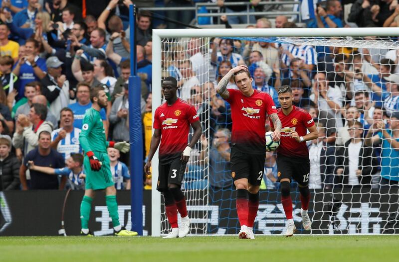 Manchester United's Victor Lindelof and teammates react after conceding a goal. Reuters