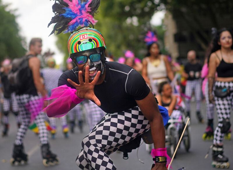 Performers on roller blades. AP 