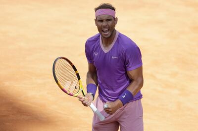 Spain's Rafael Nadal celebrates after winning his semi-final match against United States' Reiley Opelka at the Italian Open tennis tournament, in Rome, Saturday, May 15, 2021. (AP Photo/Gregorio Borgia)