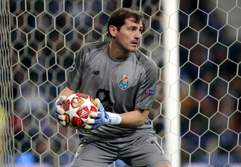 FILE - In this Wednesday, April 17, 2019 file photo, Porto goalkeeper Iker Casillas holds the ball during their Champions League quarterfinals, 2nd leg, soccer match against Liverpool at the Dragao stadium in Porto, Portugal. Veteran goalkeeper Iker Casillas has had a heart attack but is out of danger, Porto said Wednesday, May 1. The Portuguese club said Casillas fell ill during a practice session and remains hospitalized, but the â€œheart condition has been resolved.â€  (AP Photo/Luis Vieira, file)