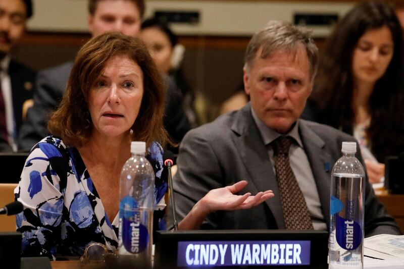 FILE PHOTO: Cindy Warmbier speaks as her husband Fred, parents of Otto Warmbier, looks on during a symposium on possible ways of international cooperation to urge the Democratic Republic of Korea (DPKR) to take concrete actions to improve the human rights situation in the DPRK at the United Nations headquarters in Manhattan, New York, U.S., May 3, 2018. REUTERS/Shannon Stapleton/File Photo