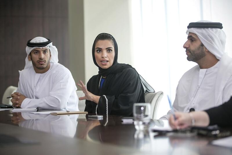 Hareb Mubarak Al Muhairy, senior vice-president for corporate and international affairs at Etihad, right, said that doing a music video clip describing the Arabic poetry and calligraphy was the right approach for the advert. Mona Al Marzooqi / The National