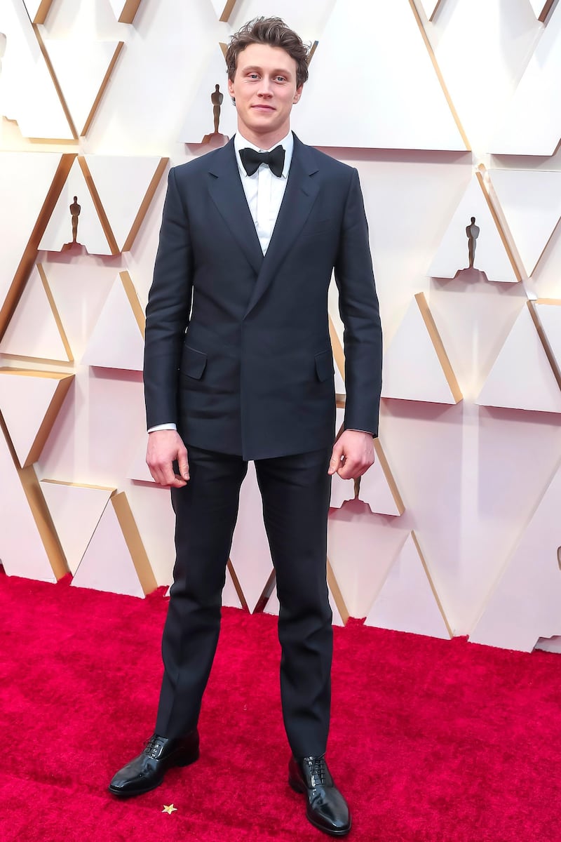 George MacKay, wearing Dunhill, arrives at the Oscars on Sunday, February 9, 2020, at the Dolby Theatre in Los Angeles. EPA
