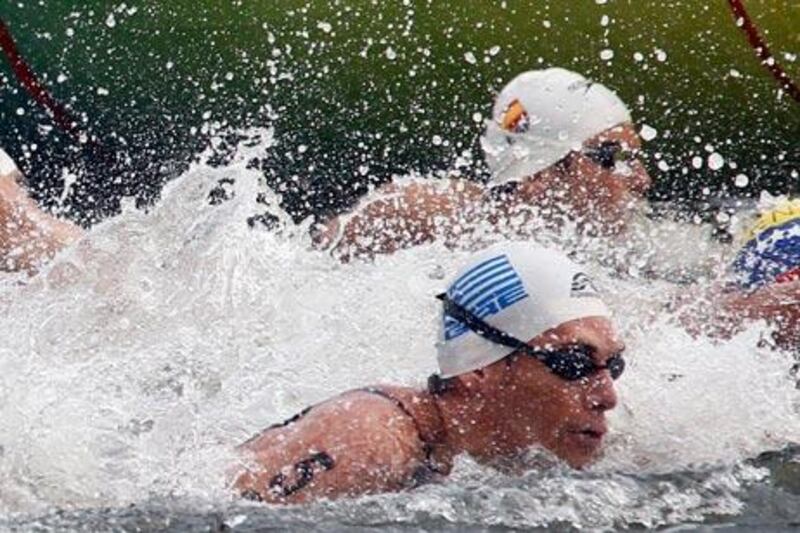 Spyros Gianniotis broke free from the pack after the final turn to win the gold.