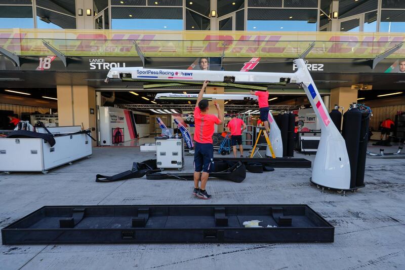Abu Dhabi, United Arab Emirates, November 26, 2019.    Abu Dhabi grand Prix  preparations 2019.-- Pit stop technicians assemble a hoist in preparations for race day.Victor Besa / The NationalSection:  SPReporter:  Simon Wilgress-Pike