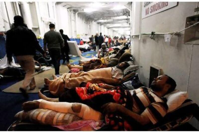 Injured Libyans onboard the Turkish ferry Ankara, in the port in Benghazi, Libya, before starting the 40-hour trip to Izmir.