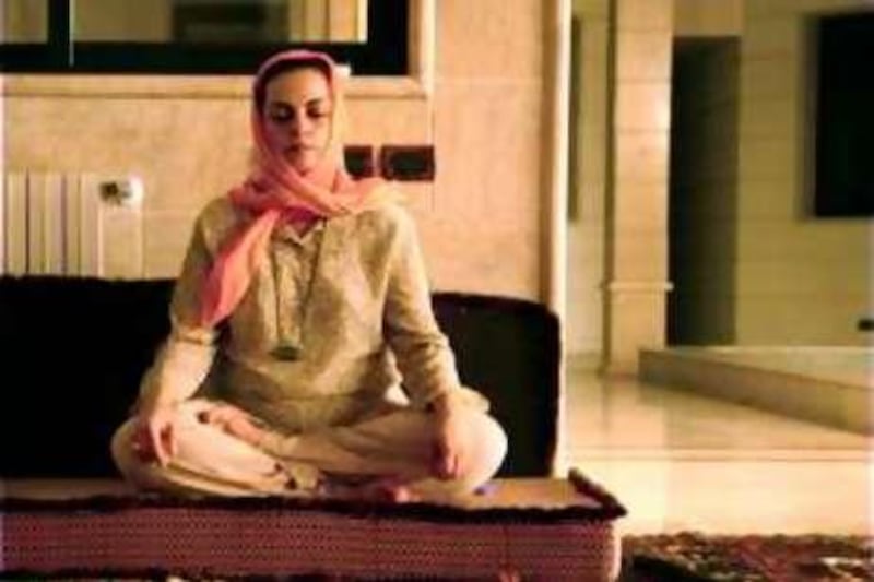 Obeida Adra meditates inside at villa in Lebanon owned by the Naqshbandi-Haqqani Sufi order. Meris Lutz for The National