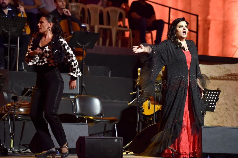 Lebanese diva Jahida Wehbe (R) performs on stage during the annual Baalbeck International Festival in Baalbeck, Beqaa Valley, Lebanon.