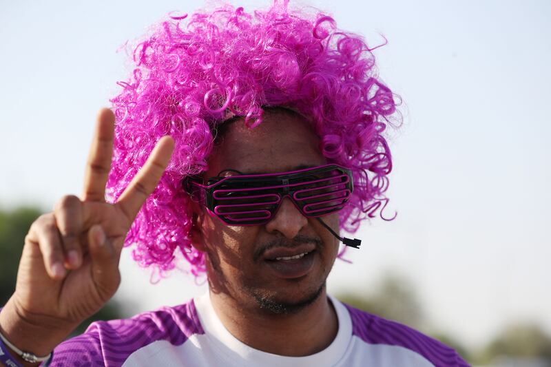 An Al Ain fan arrives at the stadium