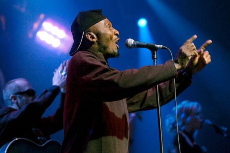 Jamaican singer Jimmy Cliff performs with 'Da Universal Playaz'  on the Mustermesse stage during a concert in Basel, Switzerland, late Monday, Nov. 4, 2002. (AP Photo/Keystone, Markus Stuecklin)