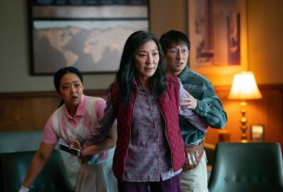 From left, Stephanie Hsu, Michelle Yeoh and Ke Huy Quan in Everything Everywhere All at Once. AP