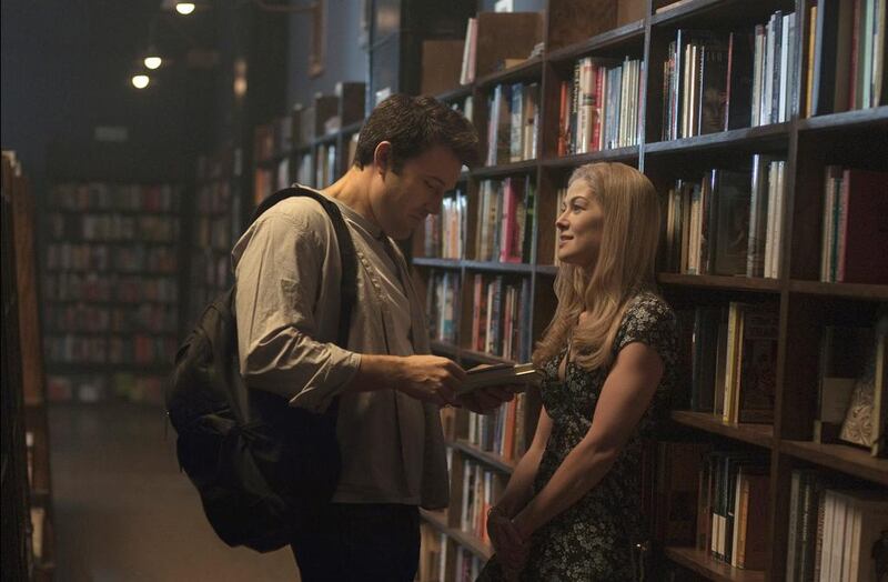 Ben Affleck and Rosamund Pike in the movie Gone Girl, based on the best-selling novel. Courtesy 20th Century Fox / AP Photo