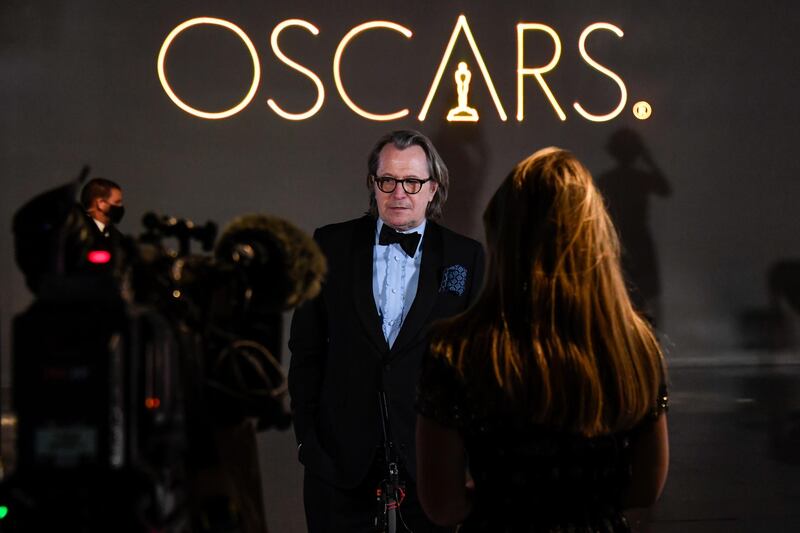 Gary Oldman is interviewed upon arrival at a screening of the Oscars in London, England. AP