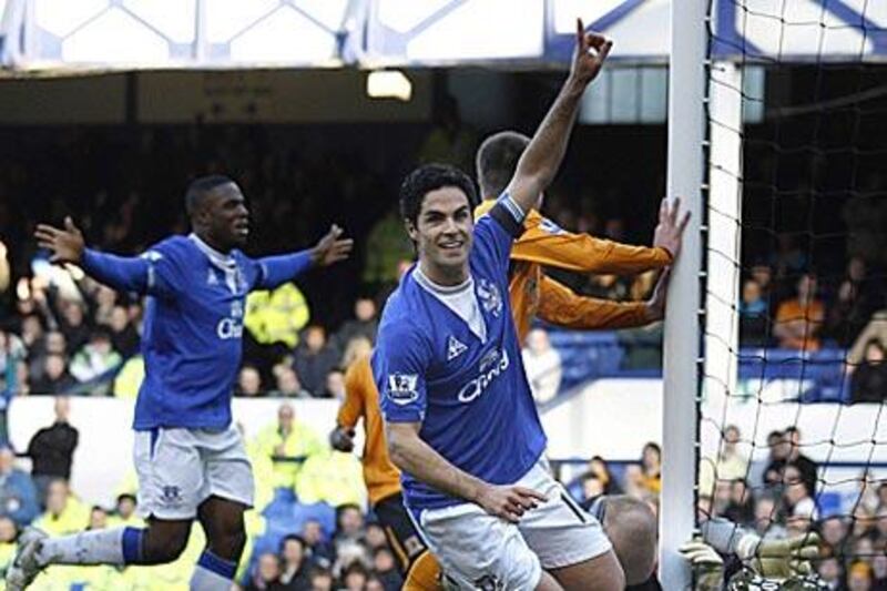 Everton's Spanish midfielder Mikel Arteta celebrates scoring the opener against Hull City at Goodison Park yesterday.