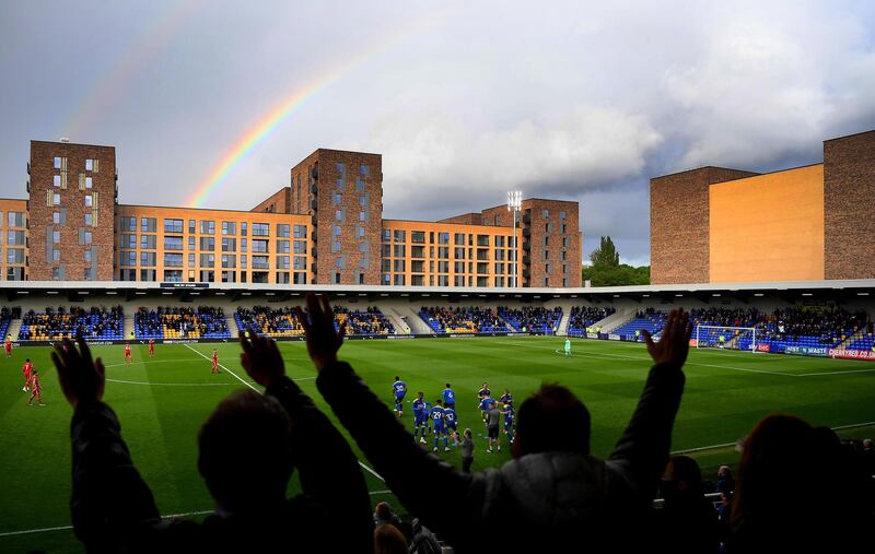 A rainbow over Plough Lane in London during a friendly match between AFC Wimbledon and Liverpool U23 on Tuesday, May 18. It was the first time fans had been allowed back into the newly built stadium due to Covid-19. Getty