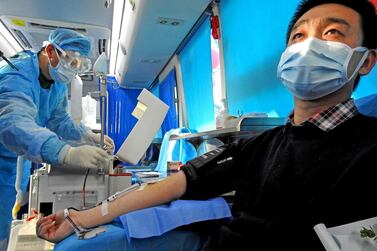 A man who has recovered from Covid-19 donates plasma in Lianyungang in China's eastern Jiangsu province on February 16. AFP
