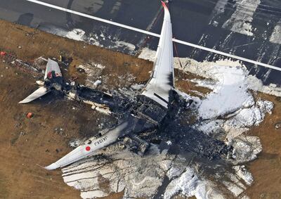 Japan Airlines Flight 516 caught fire after a collision at Haneda Airport in Tokyo earlier this month. All 379 passengers and crew survived. AP