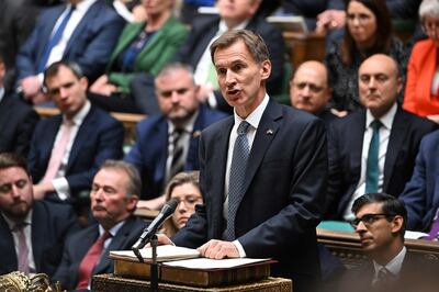 Chancellor Jeremy Hunt, who was educated at Charterhouse school, makes an autumn budget statement in the House of Commons. He condemned Labour's proposal to ditch the charitable status for private schools. AFP