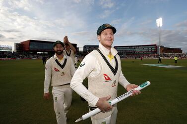 Steve Smith celebrates after Australia beat England by 185 runs at Old Trafford on Sunday to retain the Ashes. Getty
