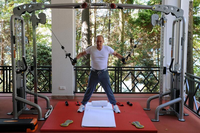Putin works out at a gym at the Bocharov Ruchei state residence in Sochi on August 30, 2015. AFP