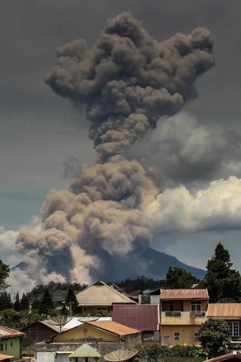 Mount Sinabung volcano spews thick volcanic ash in Karo, North Sumatra. Many residents in the area have been forced to relocate to other villages of Northern Sumatra at a safer distance from mount Sinabung volcano, one of most active in Indonesia. Ebenezer Pinem / AFP