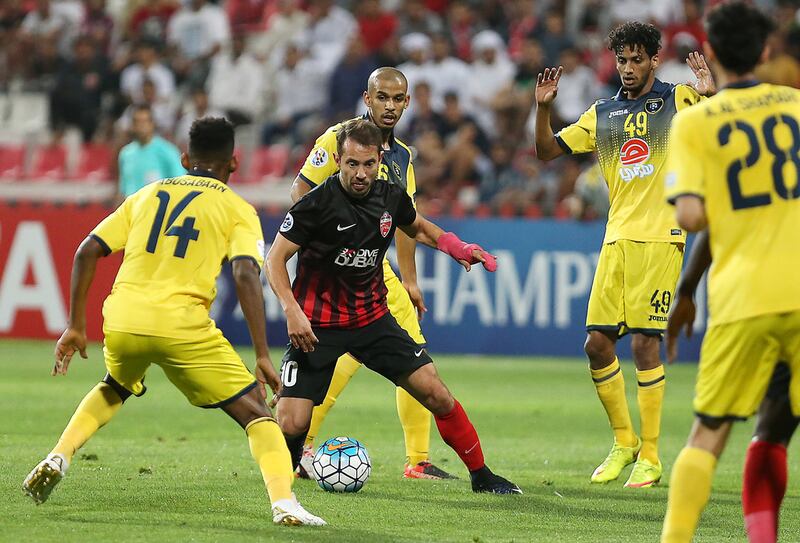 Everton Ribeiro, centre, won five trophies during his time at Al Ahli. Pawan Singh / The National