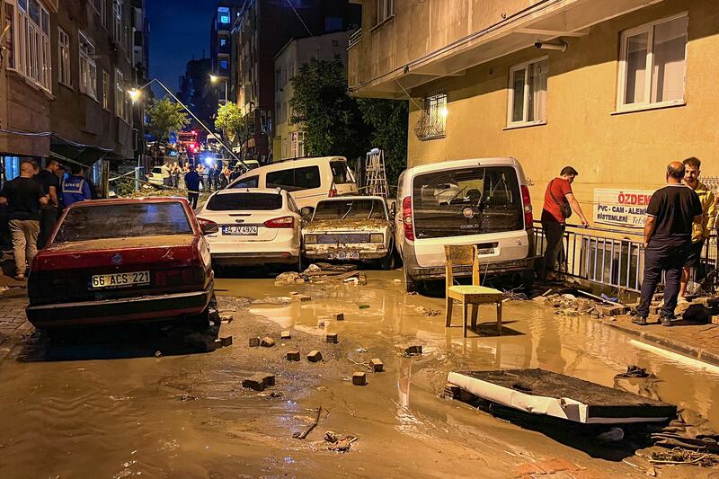 Vehicles are scattered during floods after heavy rains in Istanbul, Turkey.  AP