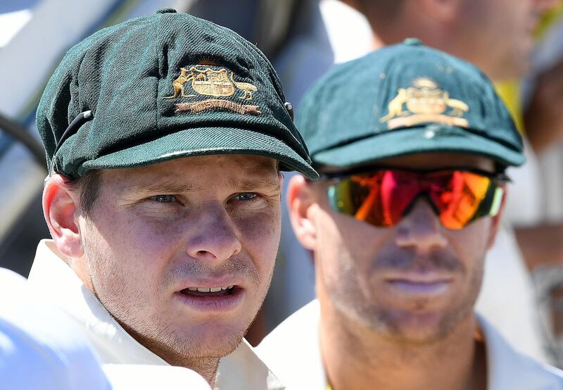 epa06628370 (FILE) - Australian captain Steve Smith (L) and David Warner look on prior to play on Day One of the Third Ashes Test match between Australia and England at the WACA ground in Perth, Australia, 14 December 2017 (reissued 25 March 2018). According to reports from 25 March 2018, both Smith and Warner stepped down as captain and vice-captain of the Australian team in consequence to a ball meddling scandal which happened during a test match against South Africa.  EPA/DAVE HUNT -- EDITORIAL USE ONLY, IMAGES TO BE USED FOR NEWS REPORTING PURPOSES ONLY, NO COMMERCIAL USE WHATSOEVER, NO USE IN BOOKS WITHOUT PRIOR WRITTEN CONSENT FROM AAP -- AUSTRALIA AND NEW ZEALAND OUT AUSTRALIA AND NEW ZEALAND OUT *** Local Caption *** 53957941