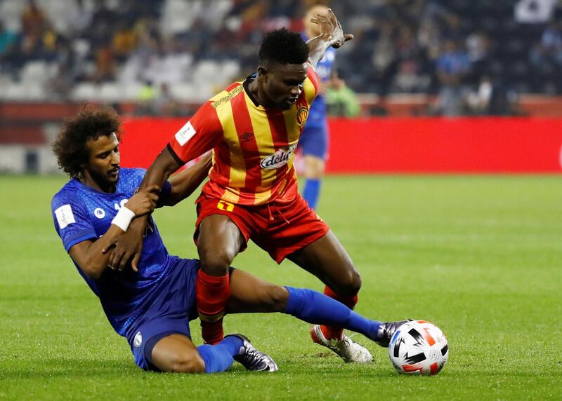 Al Hilal's Yasser Alshahrani in action with Esperance Sportive de Tunis' Kwame Bonsu during their Fifa Club World Cup match. Reuters