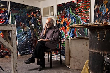 Emirati artist Hassan Sharif, who died in 2016, at his studio at The Flying house in Al Quoz, Dubai, in 2012. Antonie Robertson / The National