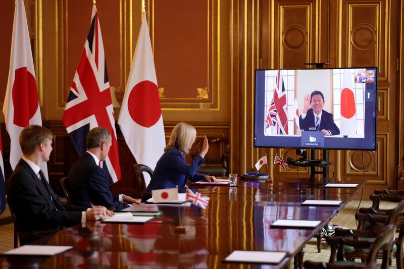 epa08660880 An undated handout photo made available by  British Department of International Trade on 11 September 2020 shows British Secretary of State for International Trade Liz Truss (3-L) during a video conference call with Japan's Foreign Minister Motegi Toshimitsu in London, Britain. On 11 September 2020 Britain has announced that it had secured a free trade deal with Japan, the country's first major post-Brexit agreement.  EPA/BRITISH DEPARTMENT OF TRADE / HANDOUT MANDATORY CREDIT HANDOUT EDITORIAL USE ONLY/NO SALES