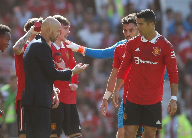 Manchester United manager Erik ten Hag speaks with Cristiano Ronaldo during the friendly against Rayo Vallecano at Old Trafford on Sunday, July 31, 2022. Reuters