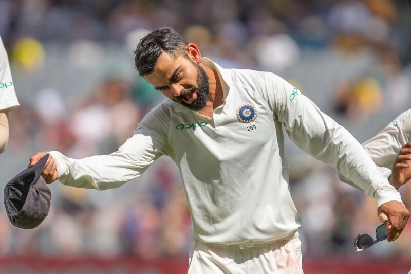 India's captain Virat Kohli takes his hat off and bows during play on day three of the third cricket test between India and Australia in Melbourne, Australia. AP Photo