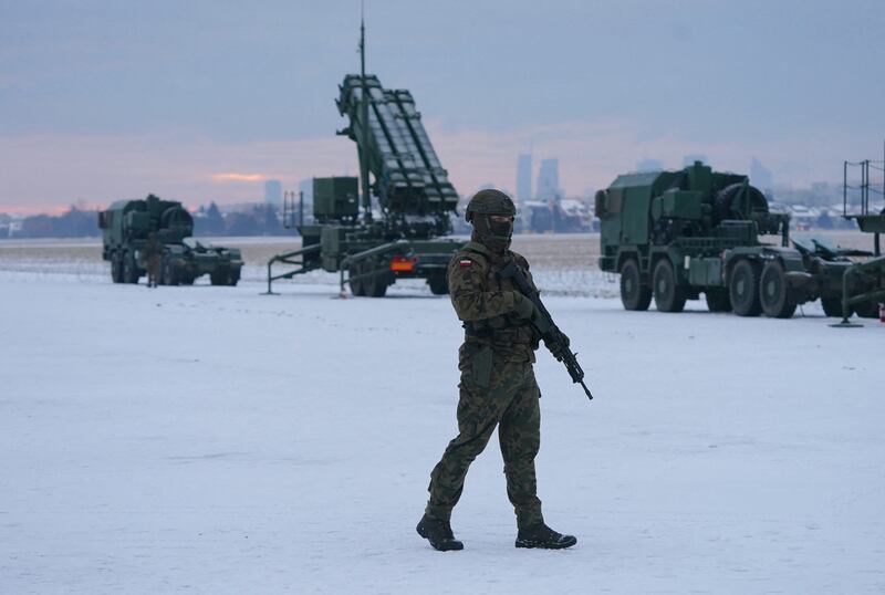 A soldier in front of a Patriot surface-to-air missile system during a military exercise at Warsaw-Babice Airport, Poland, in February. AFP