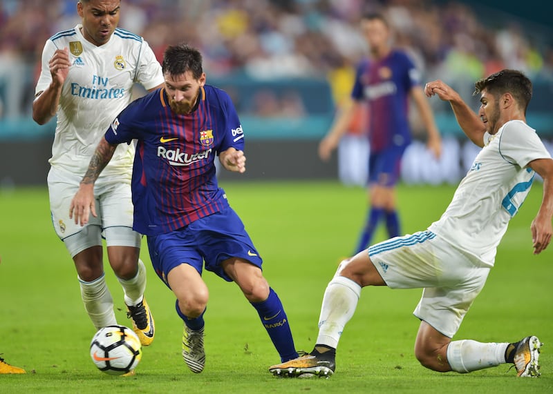 Lionel Messi was in top form for Barcelona against Real Madrid, and his manager expects extraordinary achievements from him this season. Hector Retamal / AFP