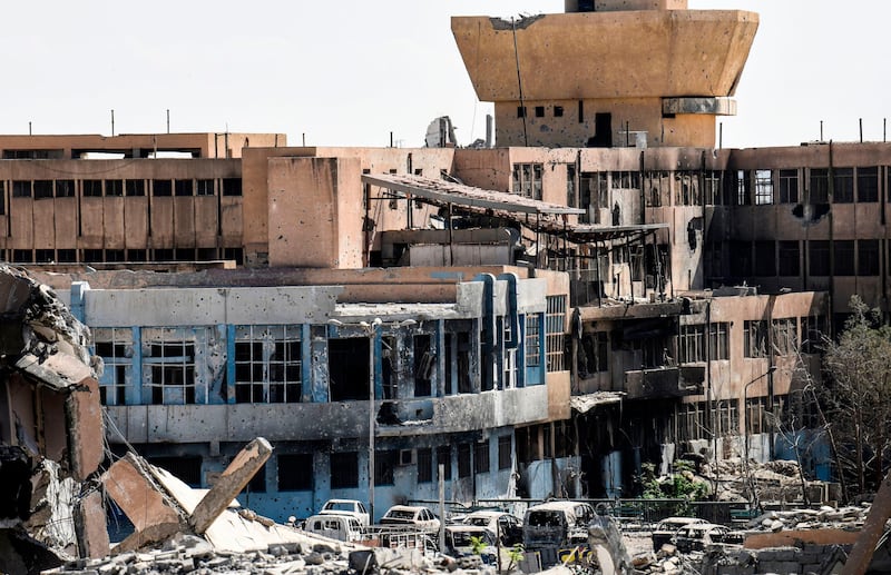 (FILES) This file photo taken on October 01, 2017 shows the damaged central hospital in the embattled northern Syrian city of Raqa.
As Syrian Democratic Forces fight to oust the Islamic State group from its last hideouts in Syria's Raqa, the city council-in-exile is already working to bring life back to its devastated home town. / AFP PHOTO / BULENT KILIC
