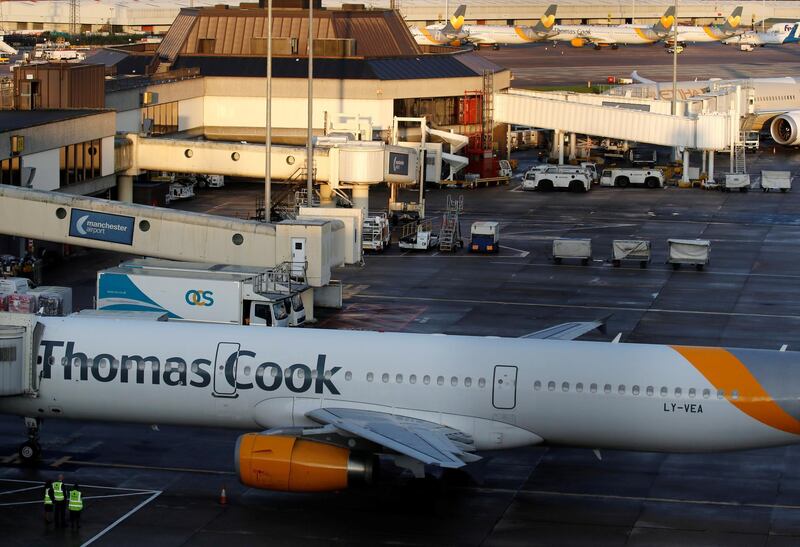 A grounded airplane with the Thomas Cook livery is seen at Manchester Airport, Manchester, Britain. Reuters