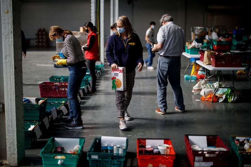 Households most reliant on Covid support measures like food banks are at greatest risk of poorer Covid recovery outcomes. AFP