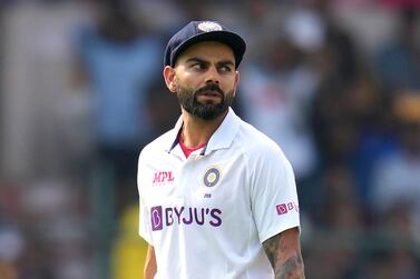 FILE - India's Virat Kohli reacts as he looks back to watch a replay of his dismissal during the first day of the second cricket test match between India and Sri Lanka in Bengaluru, India, Saturday, March 12, 2022.  Kohli is India’s most accomplished batter, with more than 10,000 runs in limited-overs formats, and he carries loads of experience.  (AP Photo / Aijaz Rahi, File)