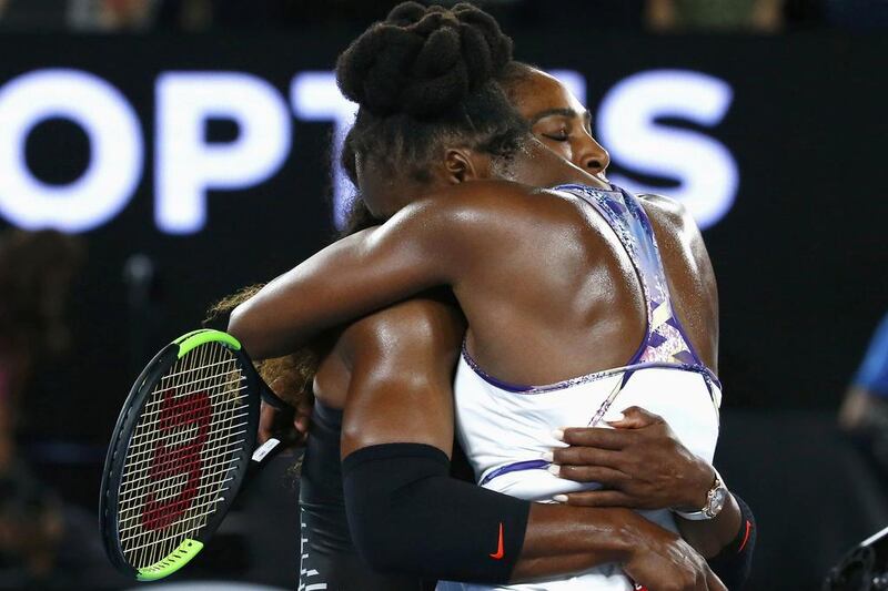 Serena Williams and Venus Williams embrace after the Australian Open final. Edgar Su / Reuters