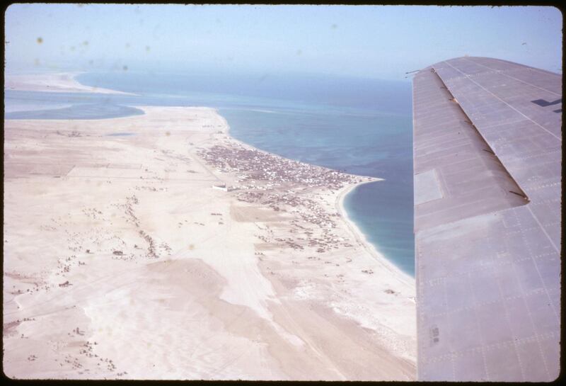 An aerial shot of a plane over Abu Dhabi in the early 1960s after taking off from a sand runway close to Sultan bin Zayed the First (Muroor Road) and 17th Street. Photo: David Riley