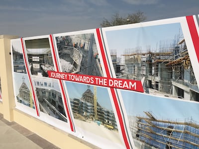 Photographs outside Our Lady of Bahrain cathedral show the construction. John Dennehy / The National