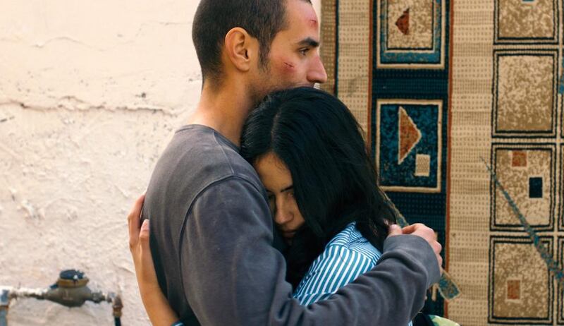 Adam Bakri, left, and Leem Lubany in a scene from the film Omar. AP Photo