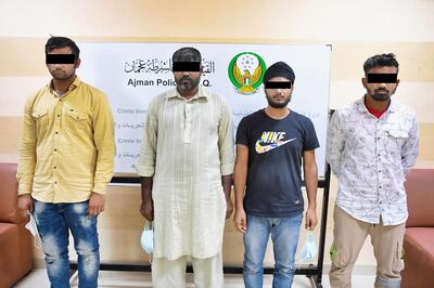 Police released this image of four men they said were accused over the killing of an apartment building owner. Courtesy: Ajman Police
