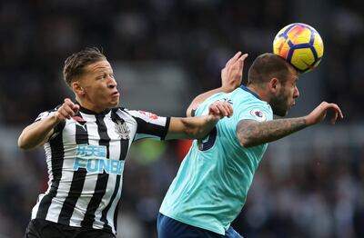 Soccer Football - Premier League - Newcastle United vs AFC Bournemouth - St James' Park, Newcastle, Britain - November 4, 2017   Bournemouth's Steve Cook in action with Newcastle United's Dwight Gayle       REUTERS/Scott Heppell  EDITORIAL USE ONLY. No use with unauthorized audio, video, data, fixture lists, club/league logos or "live" services. Online in-match use limited to 75 images, no video emulation. No use in betting, games or single club/league/player publications. Please contact your account representative for further details.