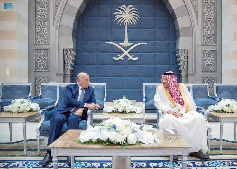 Iraqi Foreign Minister Fuad Hussein, left, meets Saudi deputy foreign minister Walid Al Khuraiji in Jeddah. SPA