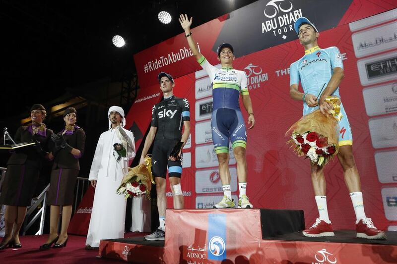 Esteban Chaves, centre of podium, became the first winner of the Abu Dhabi Tour. Elia Viviani, in black, won Stage 4. Antonie Robertson / The National