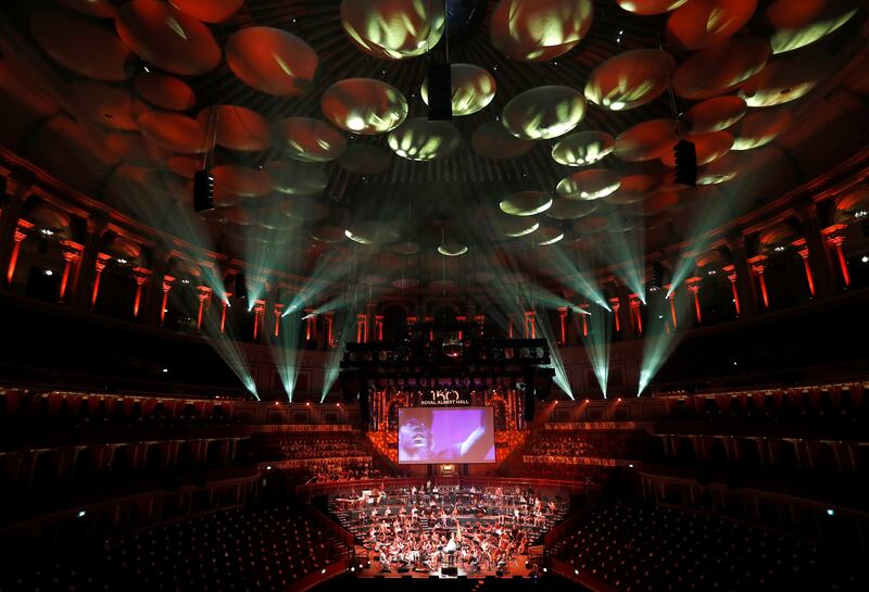 Nicholas Dodd conducts the Albert's Orchestra during a dress rehearsal of the 150th Anniversary Concert: David Arnold's 'A circle of sound', at the Royal Albert Hall in London, Britain, July 19, 2021.   REUTERS / Peter Nicholls