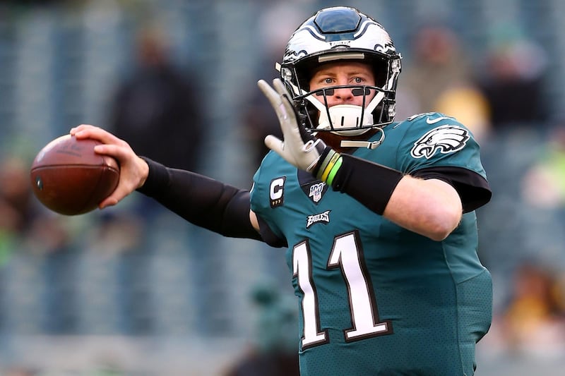 PHILADELPHIA, PENNSYLVANIA - JANUARY 05: Carson Wentz #11 of the Philadelphia Eagles warms up prior to their game against the Seattle Seattle in the NFC Wild Card Playoff at Lincoln Financial Field on January 05, 2020 in Philadelphia, Pennsylvania.   Mitchell Leff/Getty Images/AFP
